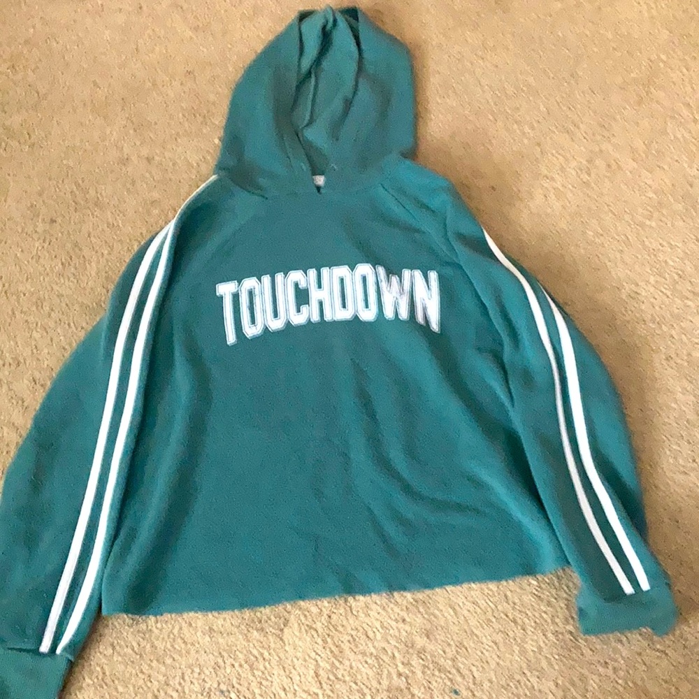 Green football hoodie.